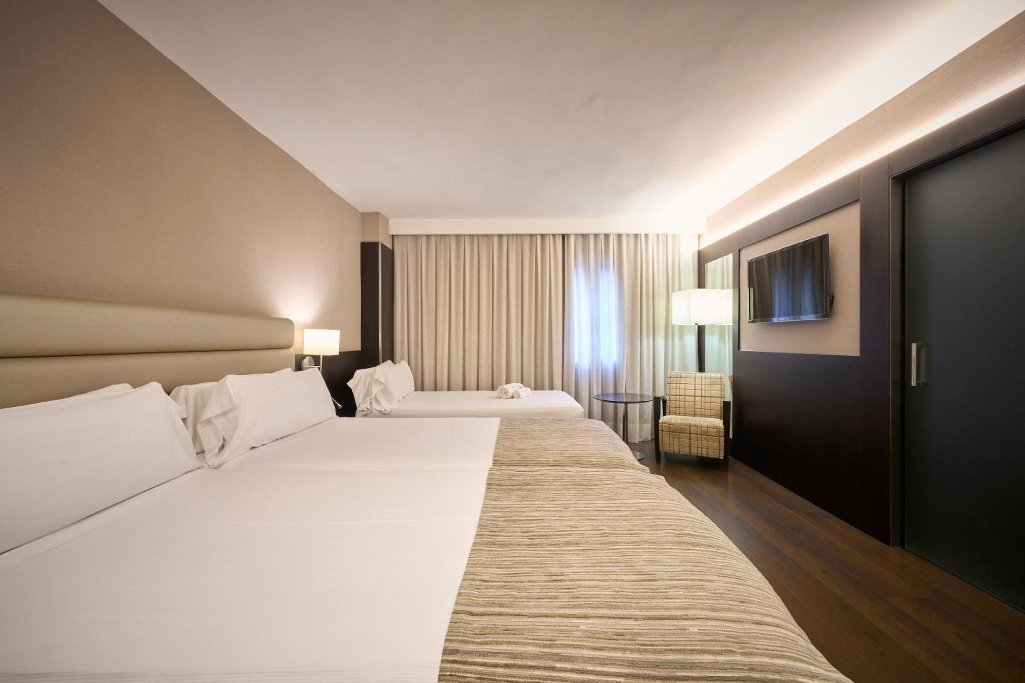 Triple Room (2 Adults + 1 Child)