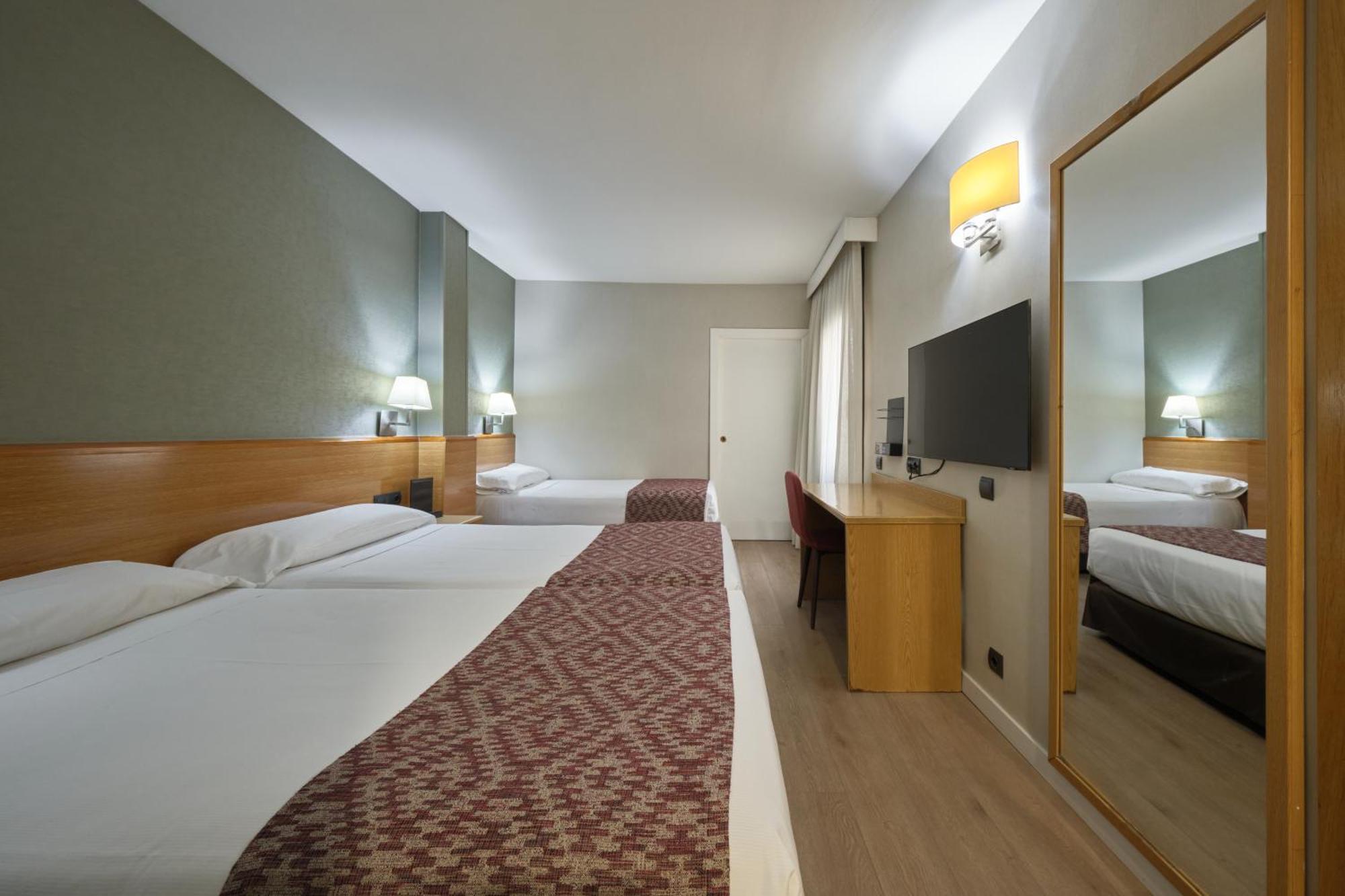 Triple Room (2 Adults + 1 Child)